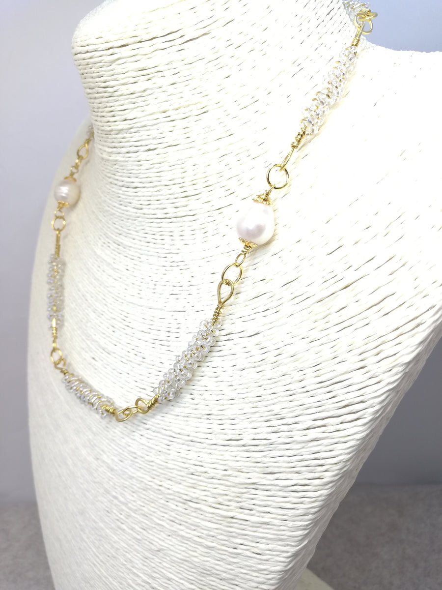 Parure in ottone a spirale