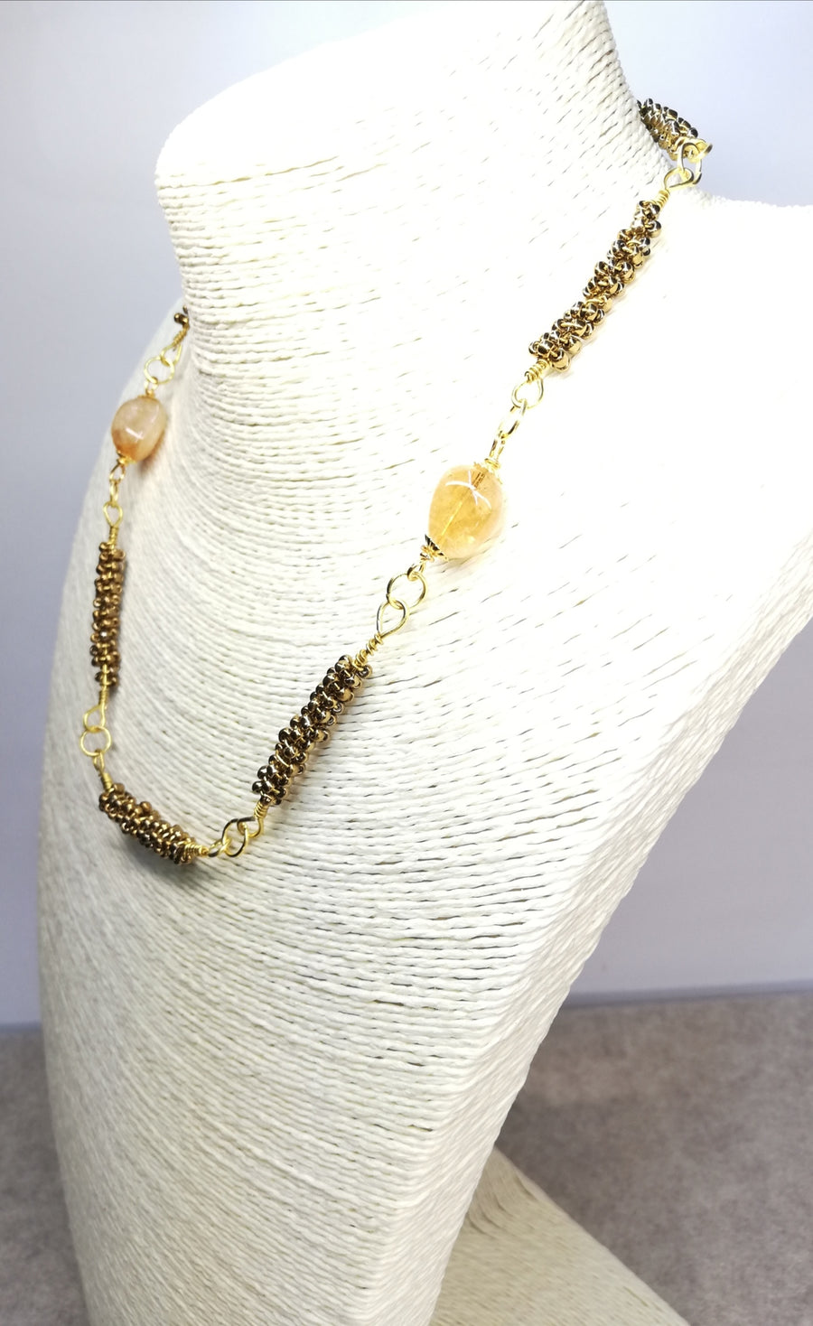 Parure in ottone a spirale