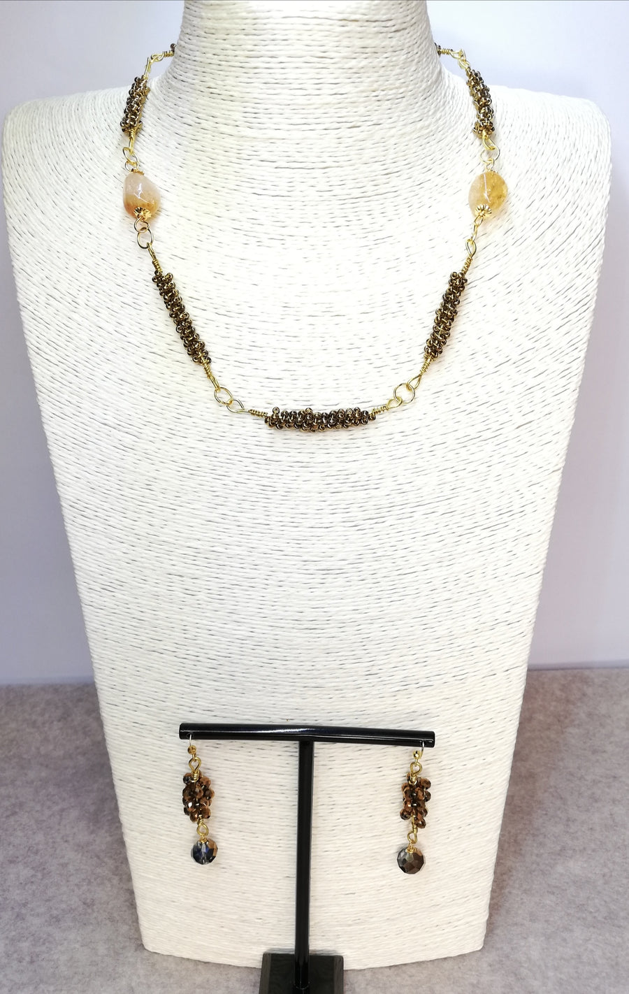 Parure in ottone a spirale
