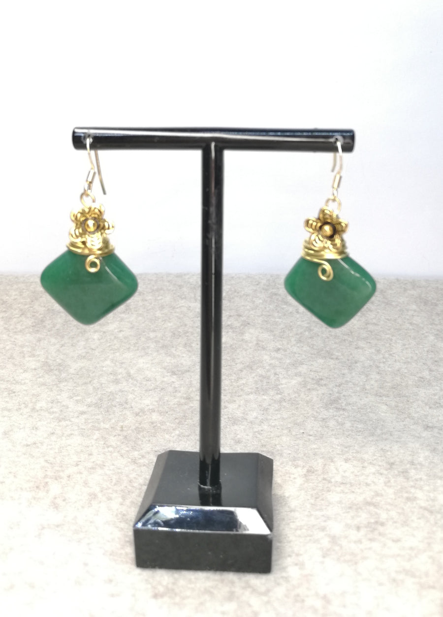 Orecchini a rombo con fiore